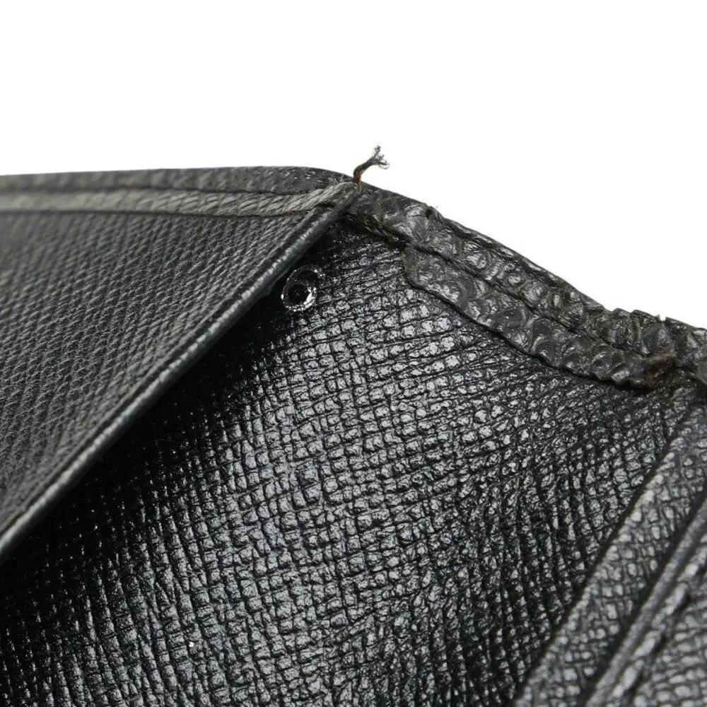 Louis Vuitton Taiga Bi-fold Wallet M30392